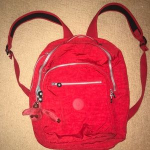 Red Kipling backpack w. school/work sized pockets